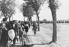 Mass expulsion of Poles in 1939 as part of the German ethnic cleansing of western Poland annexed to the Reich Bundesarchiv R 49 Bild-0131, Aussiedlung von Polen im Wartheland.jpg