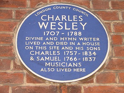 Placa conmemorativa en Westminster na casa de Wesley