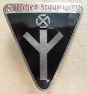 Membership badge of the Deutsches Frauenwerk, a Nazi association for women founded in October 1933 Deutsches Frauenwerk M1-102 (Frank & Reif Stuttgart) obverse.JPG