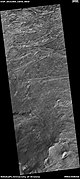 Wide view of layers in Crommelin crater, as seen by HiRISE. Parts of this photo are enlarged in following images.