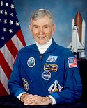 The official NASA portrait of astronaut John Young in 2002.