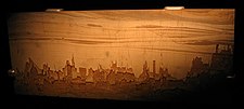 Natural patterns on the polished surface of "landscape marble" can resemble a city skyline or even trees (see photo).