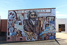 A mural located on the Winston-Salem Chronicle building that honors the history of black press in the United States Looking Back Winston-Salem Mural.jpg