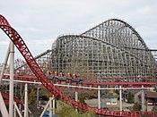 An overview of the Mean Streak roller coaster in the background with the Maverick roller coaster in the foreground