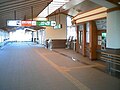 西若松駅窓口（写真右、2006年3月）