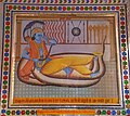 Depiction of Neminatha on Naag as bed, chakra on foot finger and conch played by nose at Parshvanath temple, Tijara