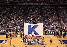 The Kentucky cheerleaders at Rupp Arena performing the traditional "Big K" cheer during a basketball game. Seating Capacity of Rupp Arena is 23,500. RupparenaK.JPG