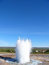 Geyser grows larger, reaching to the sky.