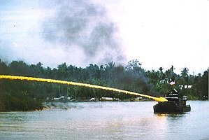 A U.S. riverboat deploying napalm during the V...