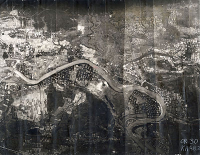 The 3rd Aerospace Rescue Recovery Group used this mosaic reconnaissance photograph to plan Lt. Col. Hambleton and 1st Lt. Mark Clark's rescue. The Cam Lo Bridge is shown at the far left. On 7 April, Hambleton was about 1,000 yards (910 m) above the river and Clark was near the river.[7]: 76 