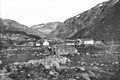 About 1900 farms at Øvstebø in Aurdalen became tourist cabins. The nearest of the two houses (to the right) is still there, built into the present Østerbø tourist cabin. The house served as the living room with the open fireplace until the seventies. Today the house is rebuilt for overnight guests. The old open fireplace is still intact in one of the rooms.