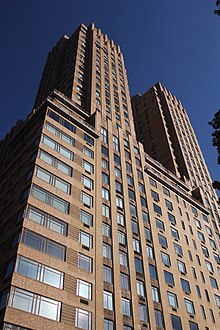 Twin towers of the Majestic as seen from Central Park West and 71st Street. At the corner with 71st Street, on the left side of the image, the windows wrap horizontally around the corner. The rest of the windows are oriented vertically.