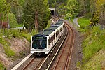 An MX3000 train on the Østensjø Line near Skullerud in 2012