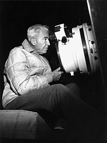Photo of Mayall observing at the prime focus of the KPNO 4-metre telescope in 1973