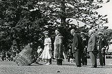 Queen Elizabeth II being greeted with a Maori ceremony (a powhiri
) before addressing a crowd. Waitangi, December 1953 Queen Elizabeth II, Waitangi (December 1953) (crop).jpg