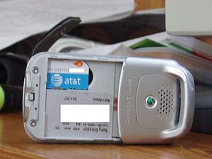 English: An AT&T Mobility mini SIM Card in a S...