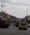 The state border (marked by traffic lights) amidst a busy traffic, seen from the Negri side