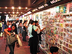 Filipino labourers are the major source of domestic helpers in Hong Kong. The photo shows Filipinos selling and purchasing pirated VCDs in Worldwide Plaza, Central.