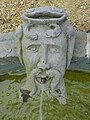 Masque en Volvic de la fontaine XVIIIe du château de La Rochette