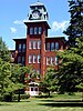 A red brick building with a clock tower