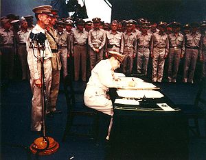 MacArthur signs Japanese surrender instrument ...