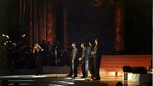 Carey and Boyz II Men performing "One Sweet Day" at Madison Square Garden Mariah Carey One Sweet Day Madison Square 1995.jpg