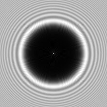 The bright spot (Arago spot) seen in the center of the shadow of a circular obstacle is due to diffraction Poissonspot simulation d4mm.jpg