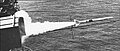 USS Okinawa fires a RIM-7 Sea Sparrow Missile in 1970.