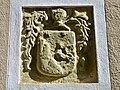 Blason dau senhor Manent (1664) sus lo mur de son ostau.