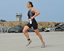 Competition and pressure for faster times have led to the development of specialized triathlon clothing that is adequate for both swimming and cycling, such as speedsuits. Speedsuit.jpg