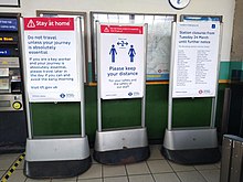 "Stay at home" and "Please keep your distance" notices on the London Underground, 27 March 2020 Stay at home and social distancing notices London Underground 27 March 2020.jpg