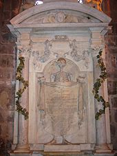 Unshrouded skeleton on Diana Warburton's tomb (dated 1693) in St John the Baptist Church, Chester TombStJohnsChester.JPG