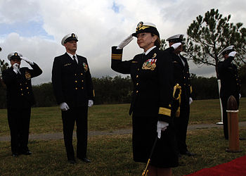 English: VIRGINIA BEACH, Va. (Oct. 24, 2007) - Rear Adm. Moira Flanders salutes as she walks through the side boys during the change of command ceremony for the Center for Personal and Professional Development on board Dam Neck Annex in Virginia Beach, Va. Capt. William Dewes relieved Capt. Jonathan Picker as commanding officer. U.S. Navy photo by Mass Communication Specialist Seaman Seth Scarlett (RELEASED)
