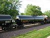 UTLX 204455, a modern tank car in a westbound Union Pacific Railroad train passing through Rochelle Railroad Park, Rochelle, Illinois, on May 29, 2005