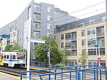 UB LRT stop at Mt. Royal Ave. In the background is the Fitzgerald building, one of two new student residence facilities at UB. University of Baltimore LRT stop, April 2012.jpg