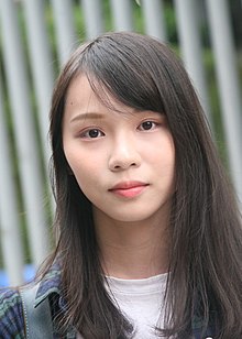 Portrait of a young adult Asian female with long hair