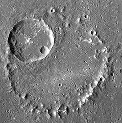 The central peak ring. The bright patches are hollows.