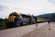 A passenger train pulls into the Denali Station in July 1998. Alaska Railroad Denali station.jpg