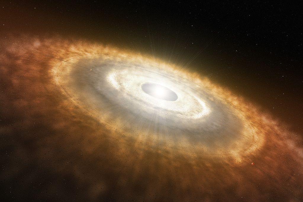 Impression_of_a_Baby_Star_Still_Surrounded_by_a_Protoplanetary_Disc