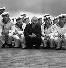 Ho Chi Minh from the Viet Minh independence movement and Viet Cong with East German sailors in Stralsund harbour, 1957 Bundesarchiv Bild 183-48579-0009, Stralsund, Ho Chi Minh mit Matrosen der NVA.jpg