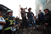 Bush addresses rescue workers at Ground Zero in New York, September 14, 2001: "I can hear you. The rest of the world hears you. And the people who knocked these buildings down will hear all of us soon."
