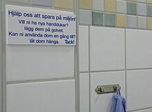 A sign on the wall of a Swedish hotel, using both the recommended dem
and the colloquial dom
for the word "them" on the same sign. Dem-dom.jpg