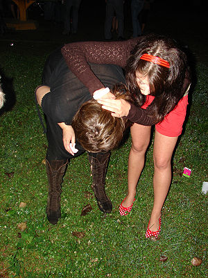 A drunk woman vomits, during a party in Zagreb...