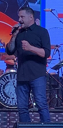 Country music singer Ty Herndon performing onstage.