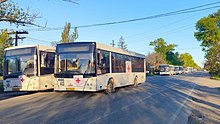 ICRC buses preparing for an evacuation convoy on 8 May 2022 to Zaporizhzhia ICRC buses for evacuation convoy from Mariupol to Zaporizhzhia (cropped).jpg