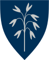 3207 Nordre Follo I blått ei havreakset i sølv. Havreakset symboliserer jordbruk og fruktbarhet, som har vært viktig i begge kommuner fra 1600-tallet.