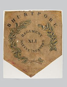 Regimental Colour Centre of the 41st Bengal Native Infantry, captured from mutineers at Delhi in 1857, showing the battle honour "Bhurtpore" Regimental Colour Centre of the 41st Bengal Native Infantry.jpg