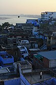 G-16. (Kite Flying) A solo kite flier in the Varanasi night sky.