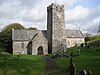 A single-storey church built in rubble masonry with a large, central, tower. Restored in the 19th century.