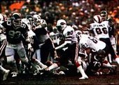 The Jets playing the Bills in the 1981 AFC wild card game. 1986 Jeno's Pizza - 30 - Joe Cribbs (cropped).jpg
